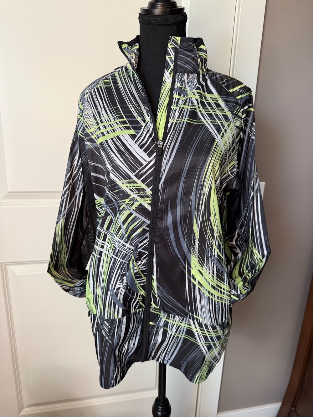 Lularoe rise determined small black white green abstract pattern windbreaker